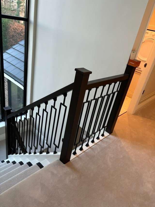 Modern staircase with black spindles