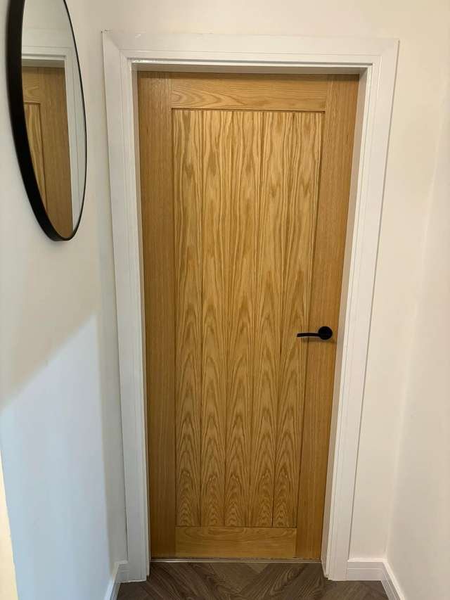 Oak internal door fitted by LMF Joinery
